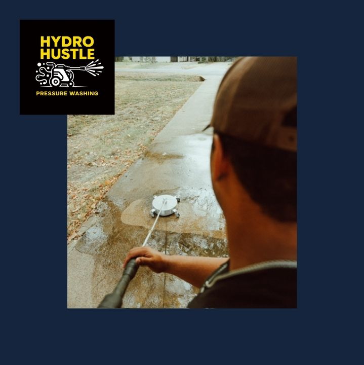 Over-the-shoulder view of Jeremiah Adams running a surface cleaner along a concrete sidewalk in Arlington, Texas